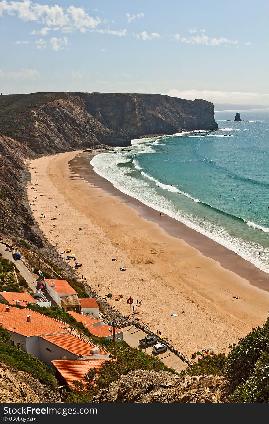 The beautiful Portuguese beach, with a rocky coastline.