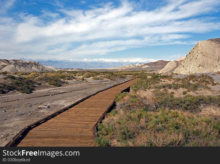 Beautiful wide view of Death Valley National Park. Wispy clouds and beautiful mountains give this photo real depth!. Beautiful wide view of Death Valley National Park. Wispy clouds and beautiful mountains give this photo real depth!