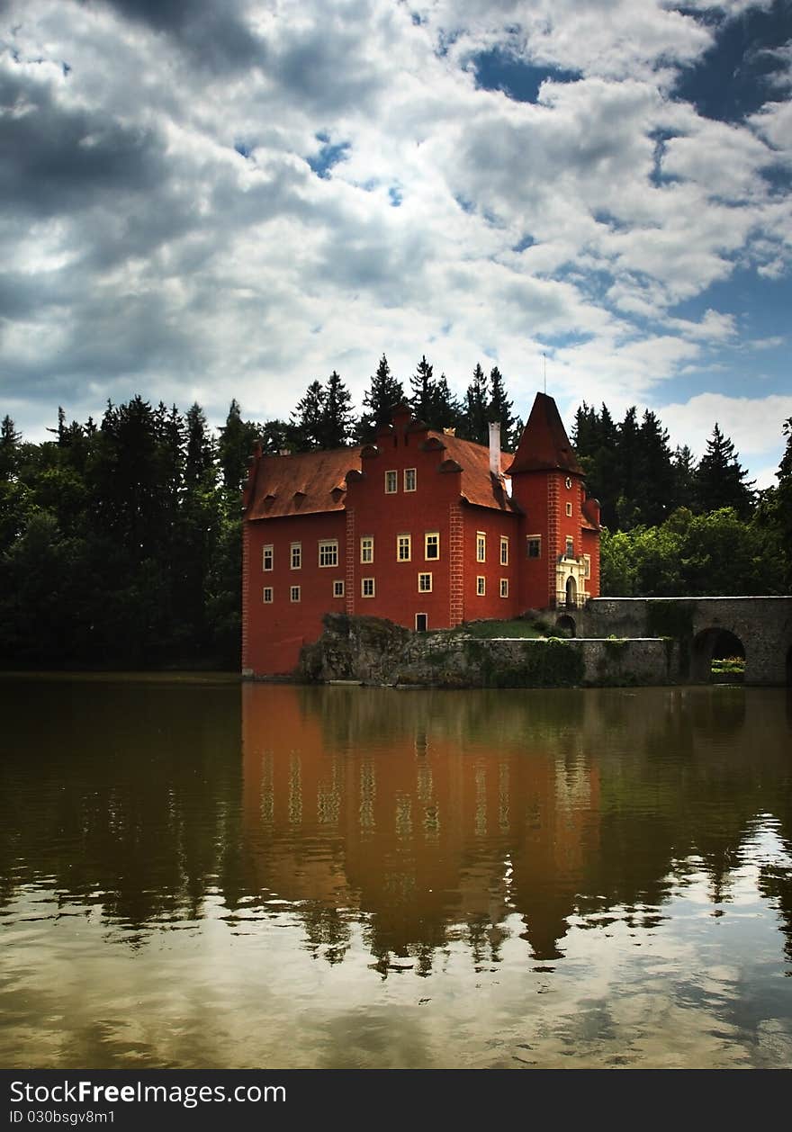 Water castle Cervena Lhota in Czech Republic and clouds. Water castle Cervena Lhota in Czech Republic and clouds.