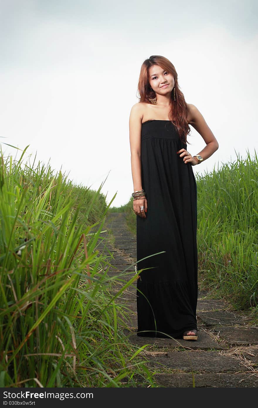 Portrait of the young beautiful smiling woman outdoors. Portrait of the young beautiful smiling woman outdoors