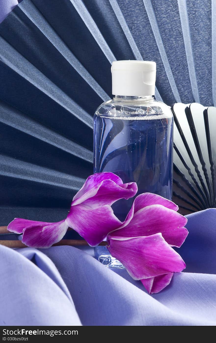 Fan ,flowers and scented oil