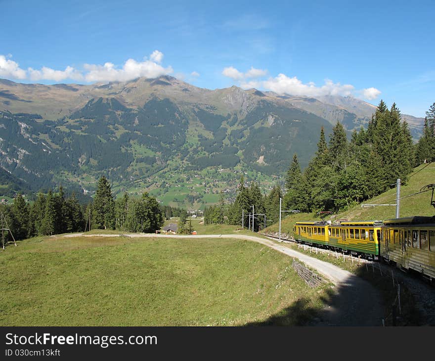 Cog-wheel train with landscape to Jungfraujoch