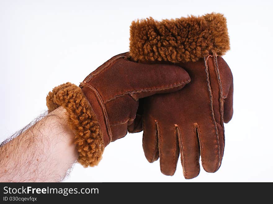 Brown leather gloves isolated on white background