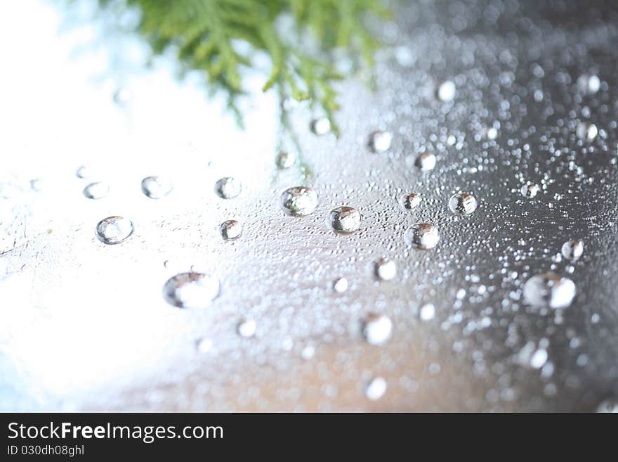 Drops falling on the glass and the reflections of a. Drops falling on the glass and the reflections of a