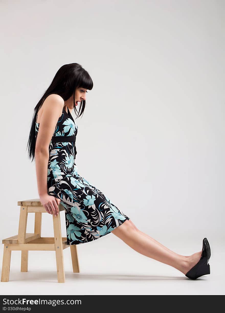 Beautiful woman sitting at the studio. Beautiful woman sitting at the studio