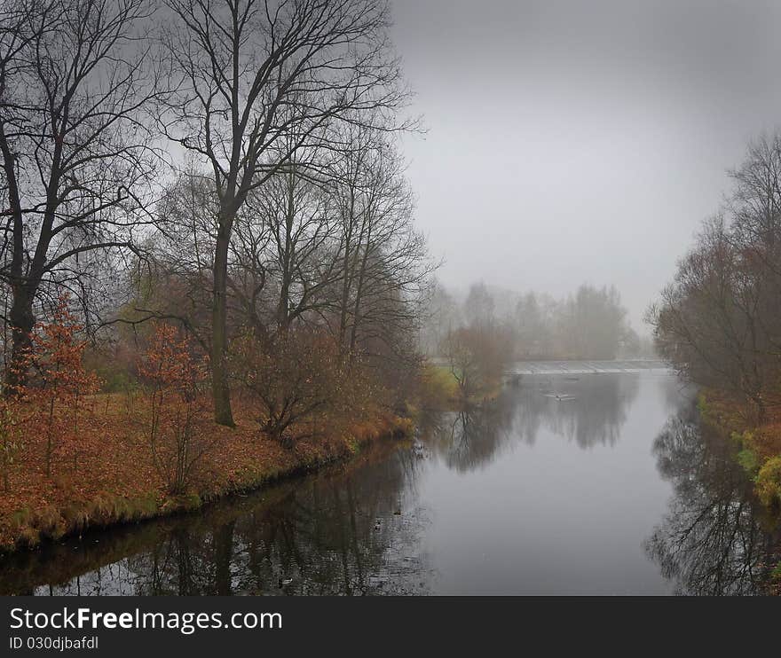 River in fogy fall day