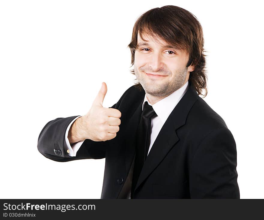 Friendly handsome businessman showing thumbs up sign