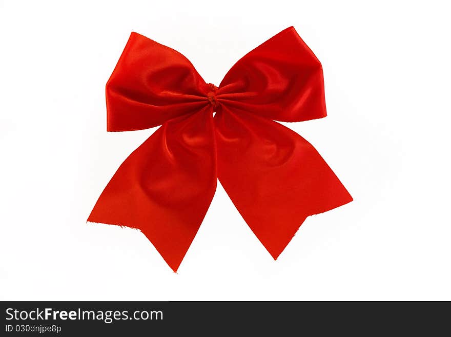 Single red bow isolated on white