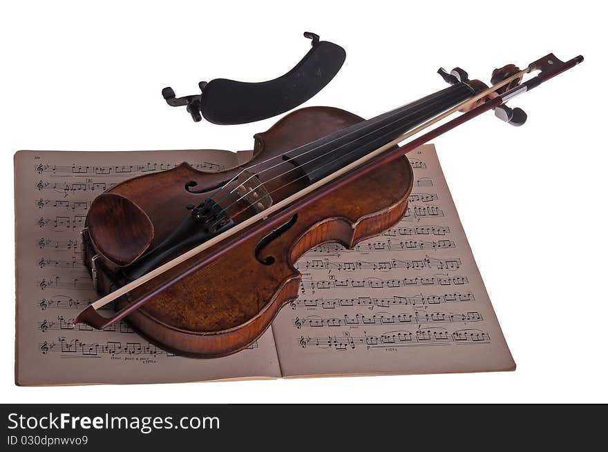 Violin with the bow and notes on a white background, Isolated