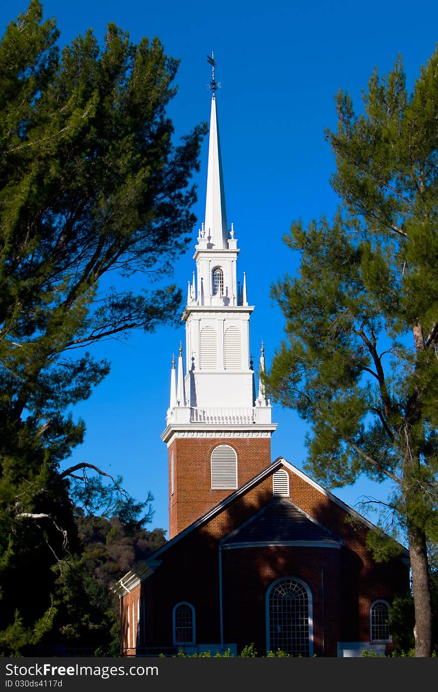 Small church with steeple in pastoral setting. Small church with steeple in pastoral setting.