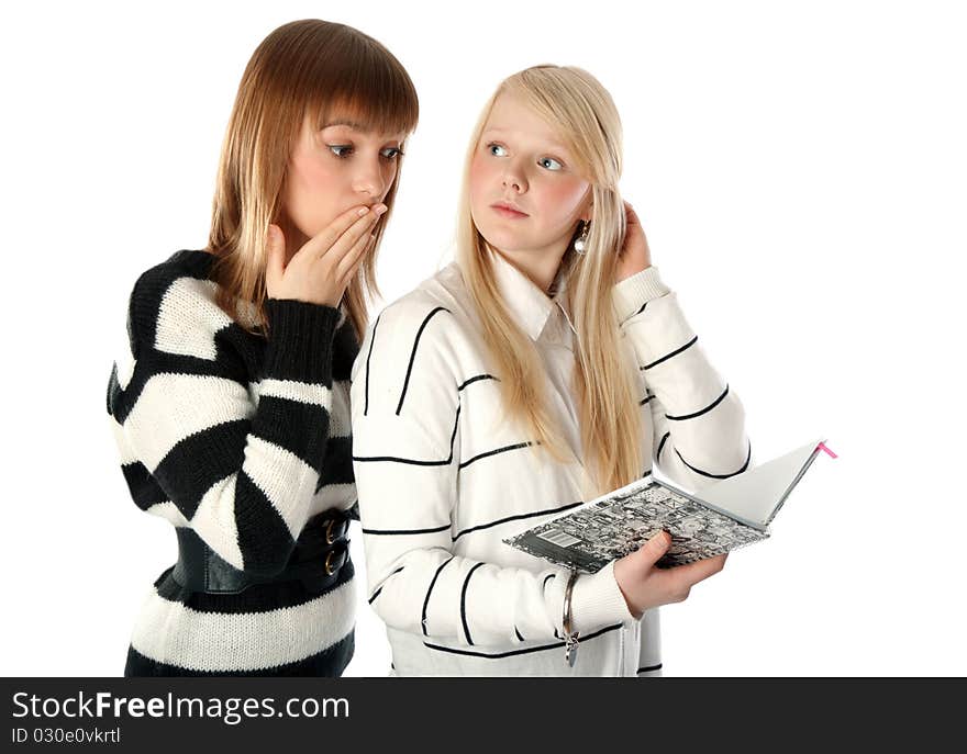 Two beautiful girls read diary book