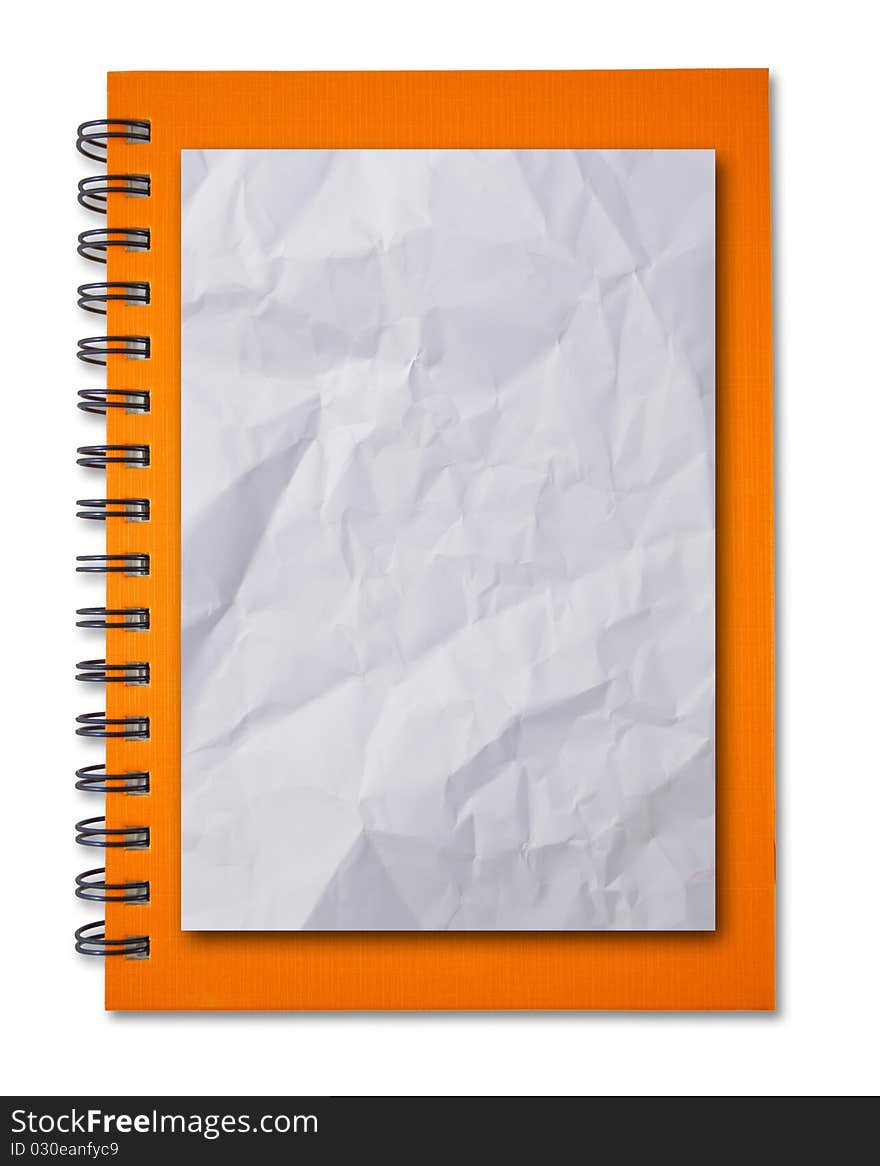 Crumpled paper on Orange notebook