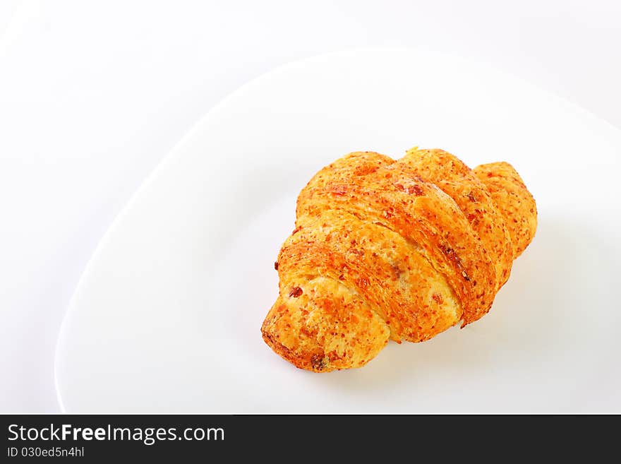 Fresh croissants on white background