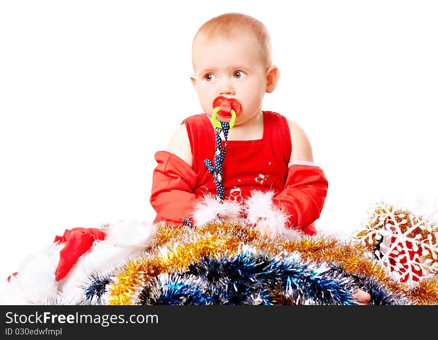 Baby in Santa Claus hat on white background