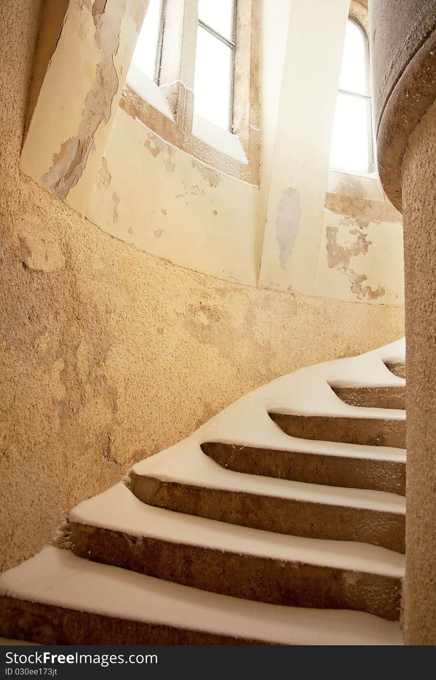 Stairs in winter with snow, indoor.