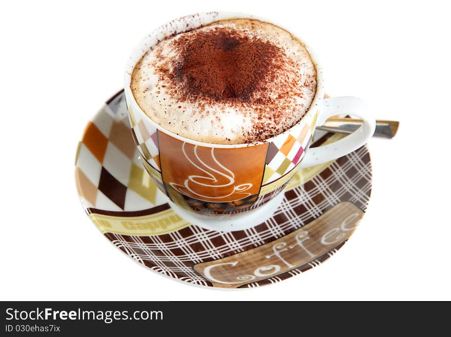 A cup of cappucino with chocolate on a white background.