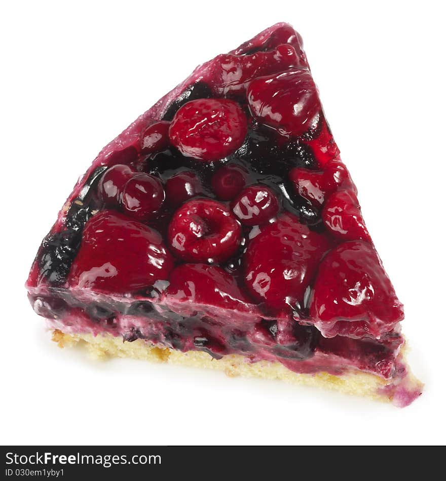 Small berries tart piece macro shot isolated over white background