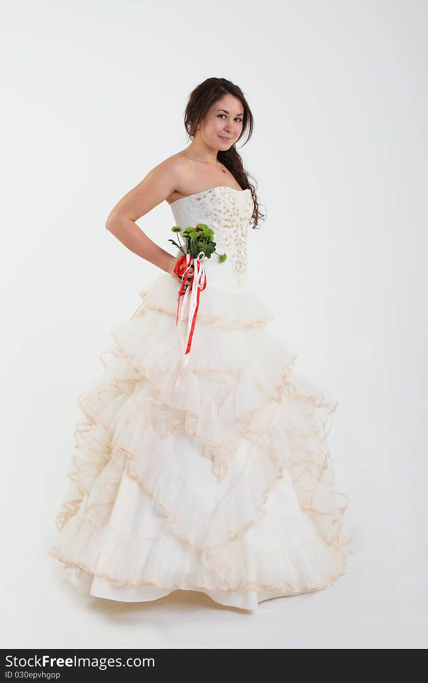 Smiling bride with bouquet