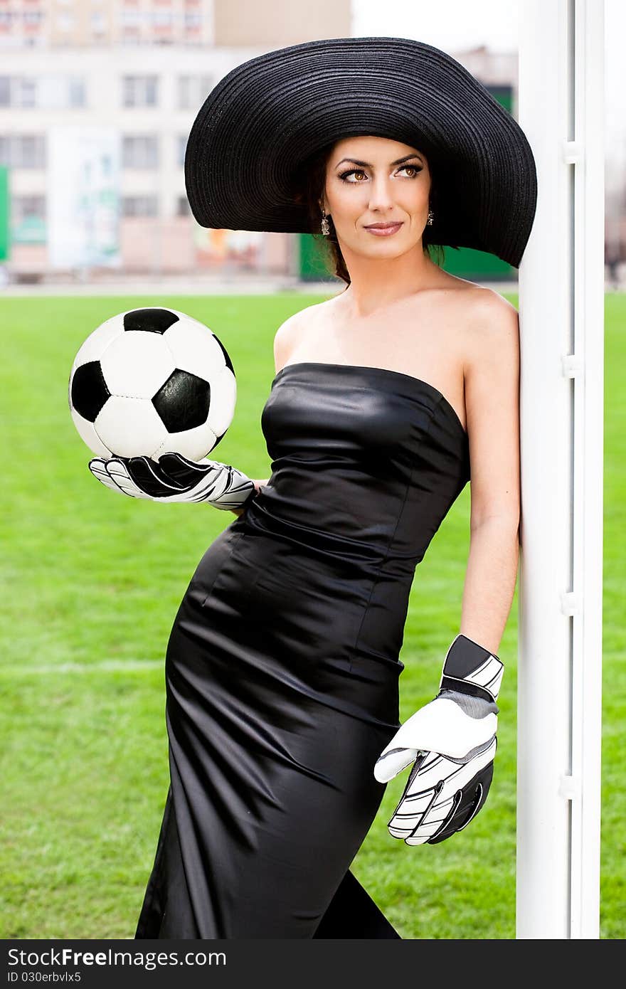 Woman With Football Ball