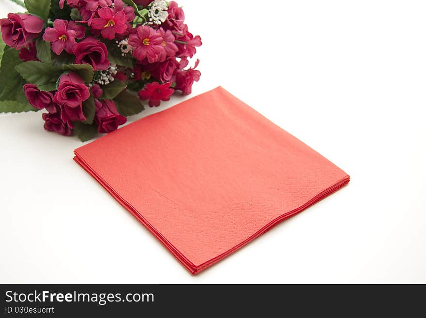 Bunch of flowers with red paper napkin