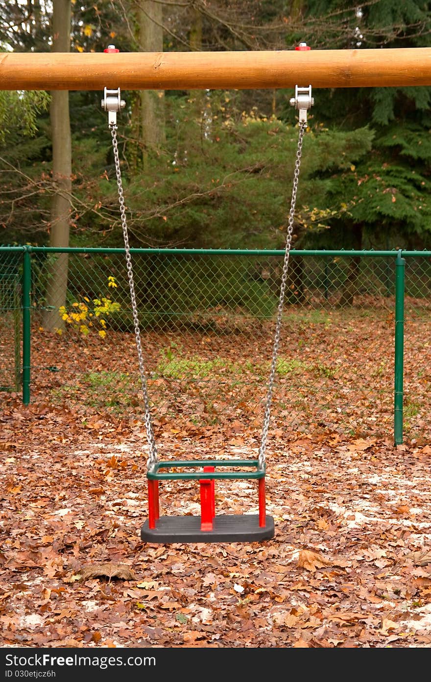 Empt swing at the playground. Empt swing at the playground