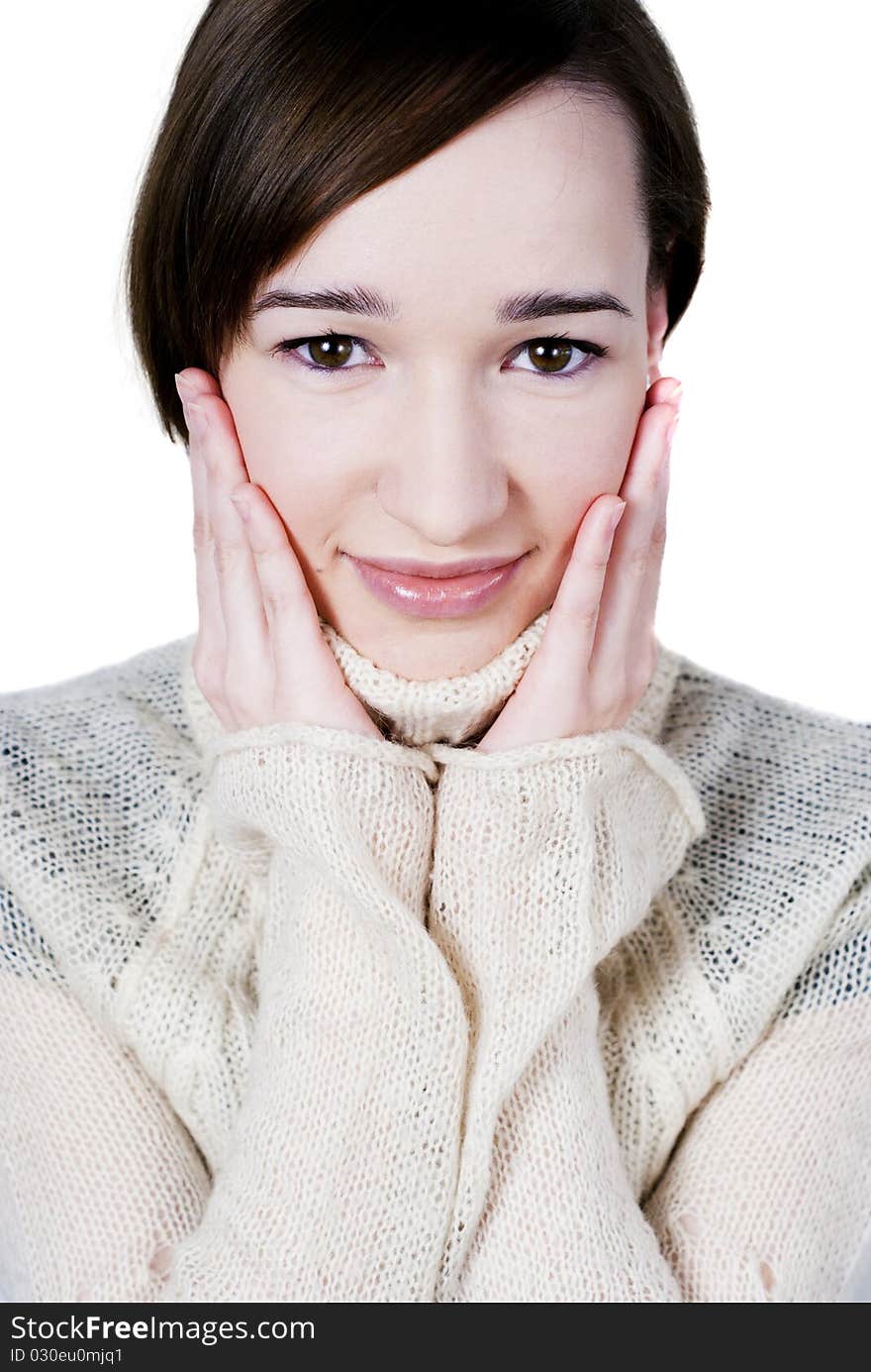 Beautiful girl in white sweater isolated