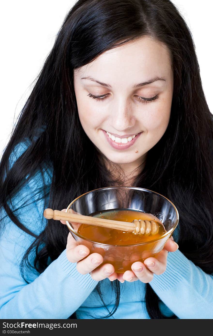 Girl holding honey bowl