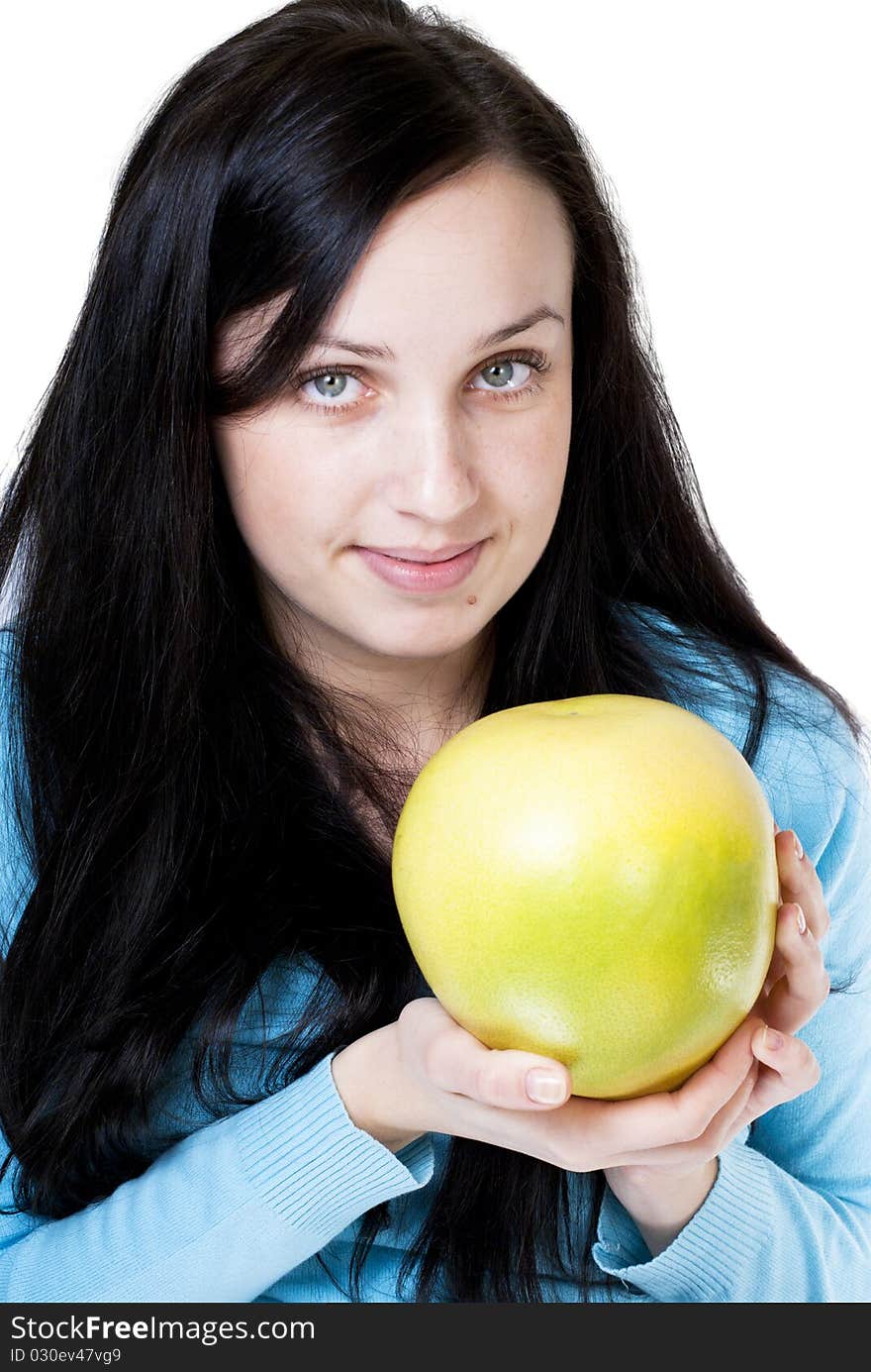 Girl holding yellow pomelo