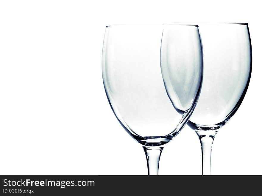 Two transparent glasses on white background