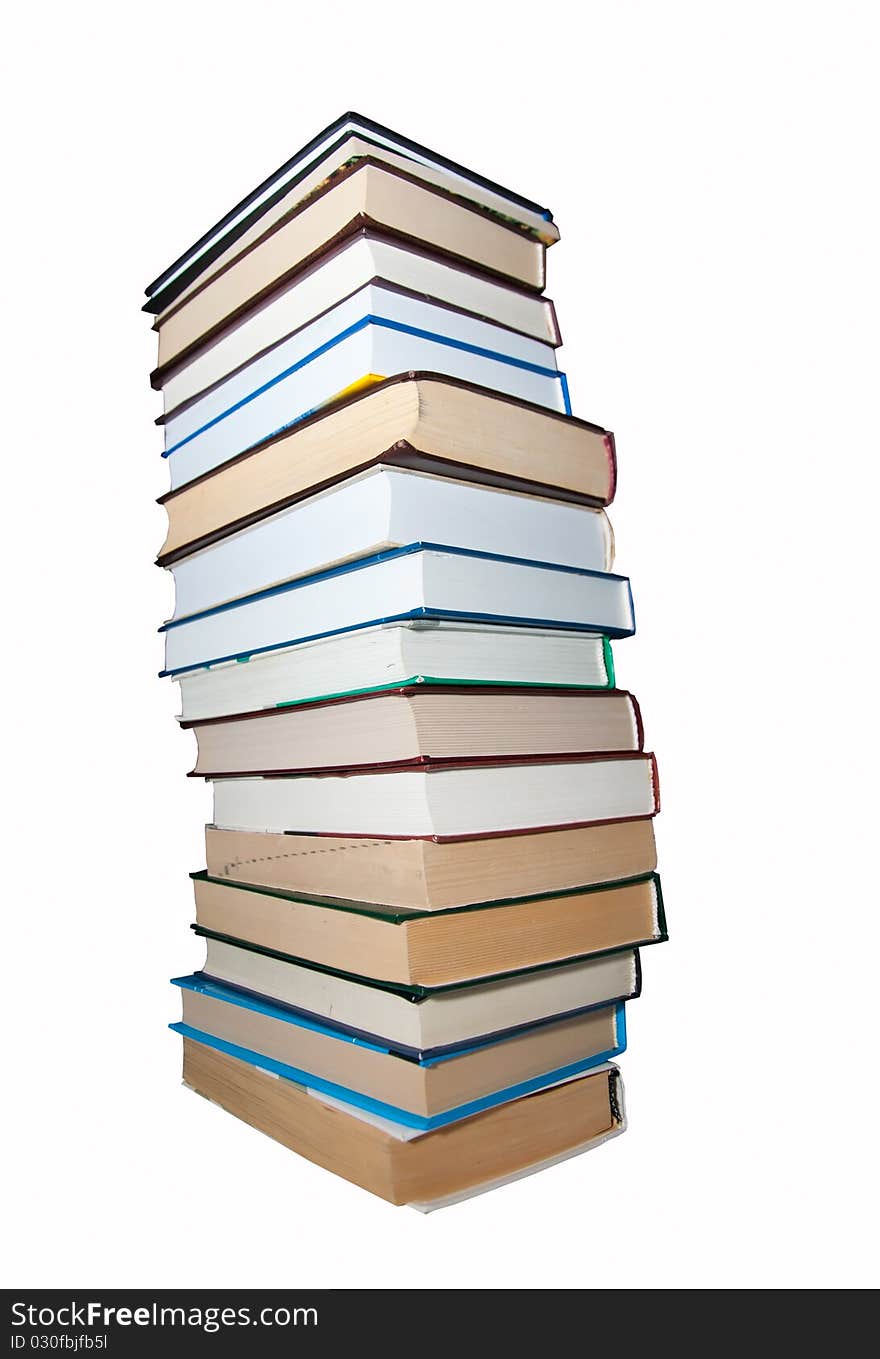 Books lined one over the other on a white background