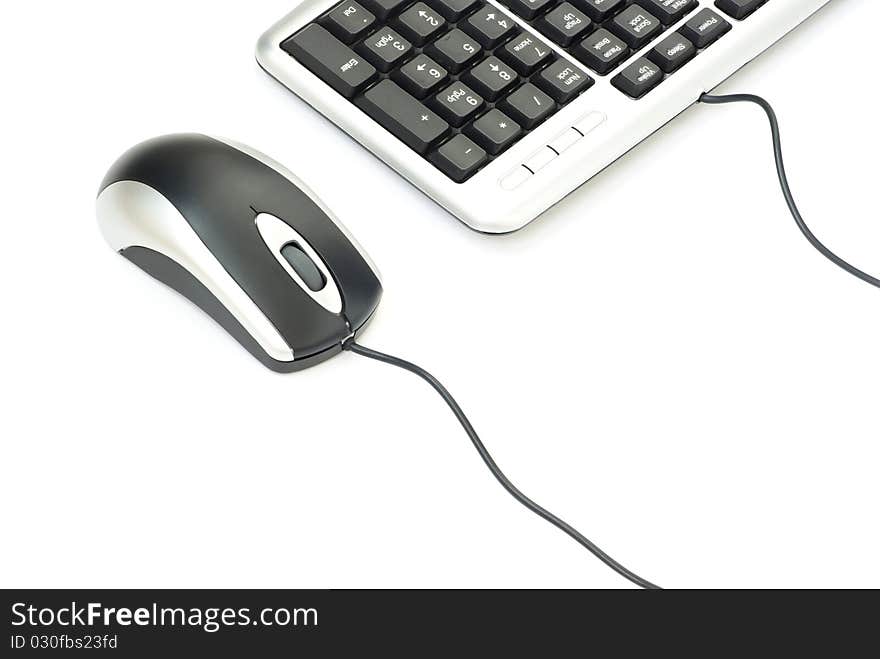 Computer mouse and keyboard isolated on white