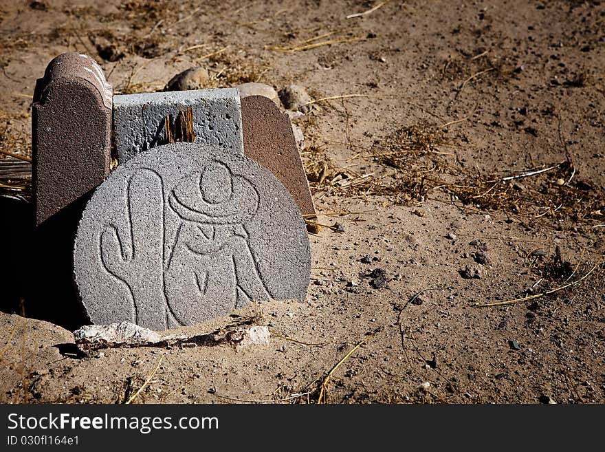 A mexican grave marker in the desert. A mexican grave marker in the desert