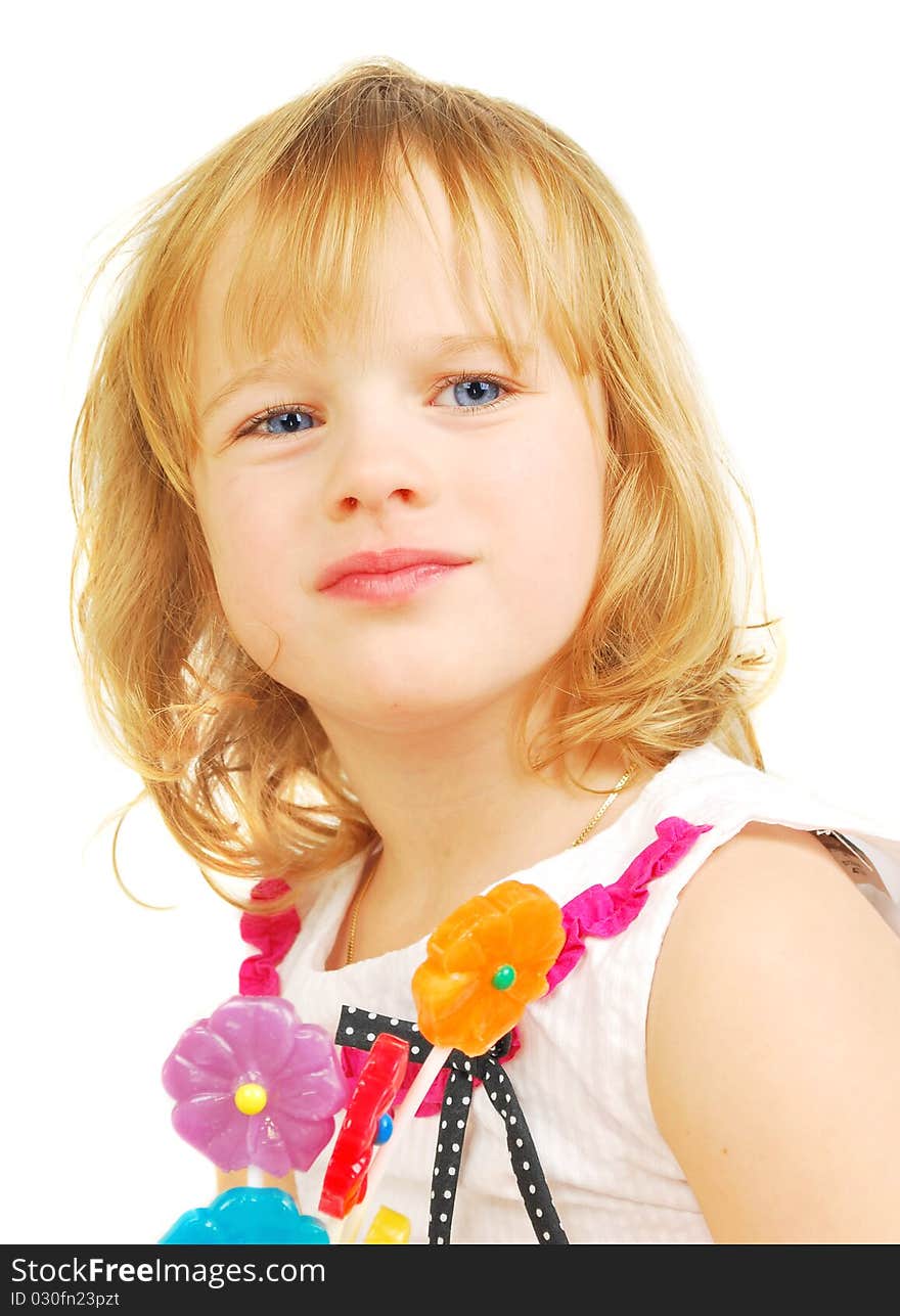 Portrait of little girl with lollipops isolated on the white background. Portrait of little girl with lollipops isolated on the white background.