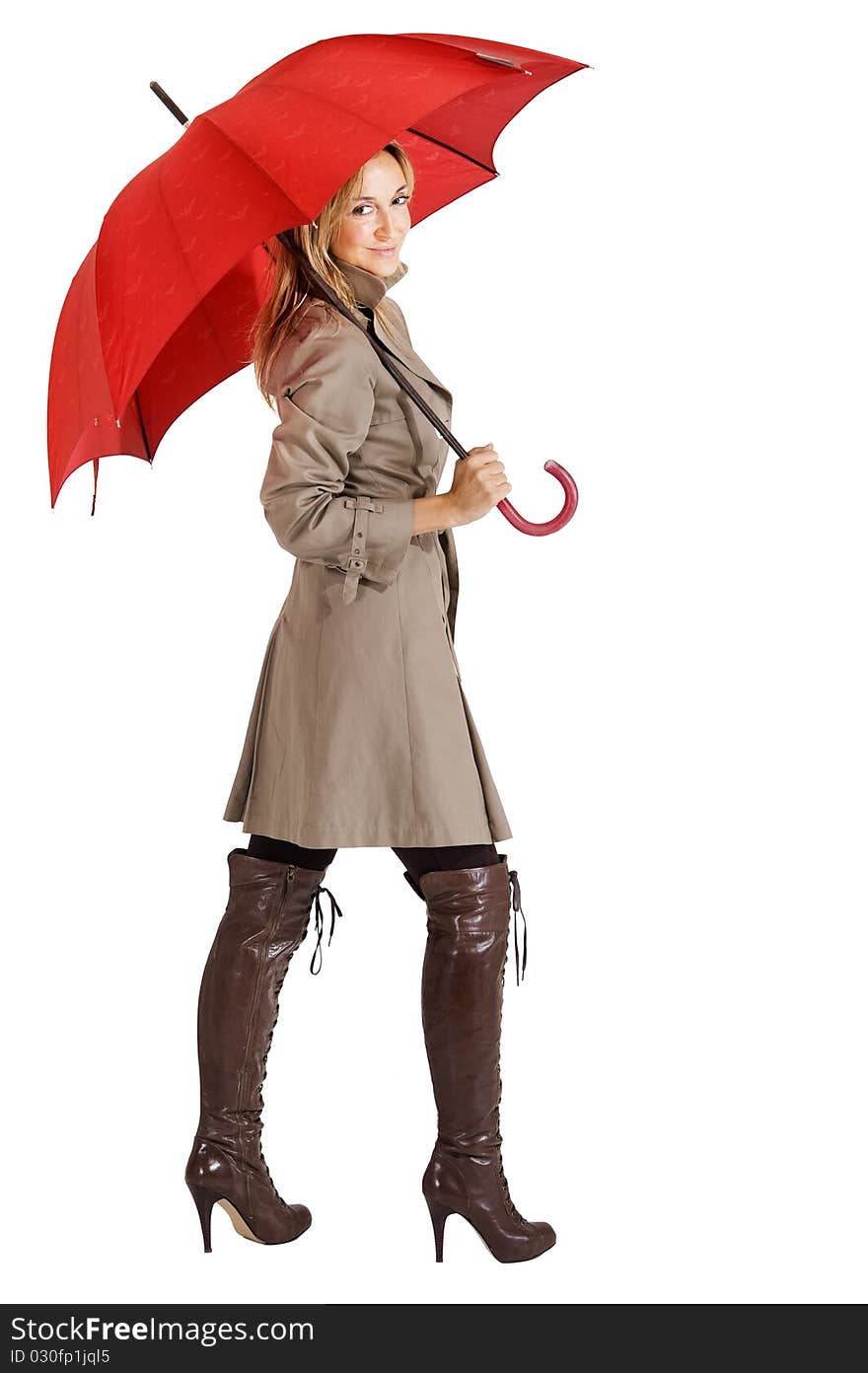 Happy smiling woman with her raincoat and umbrella. Happy smiling woman with her raincoat and umbrella