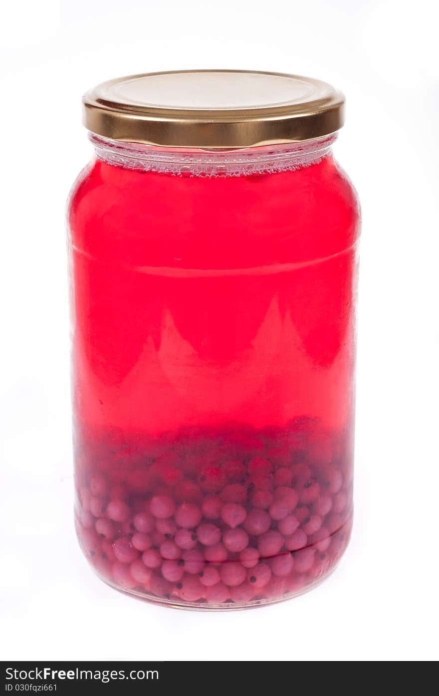 Stewed fruit in jar. Isolated on white.