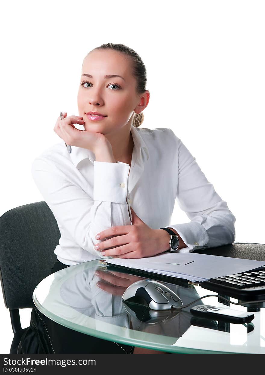 Businesswoman sits at the computer. Studio shot