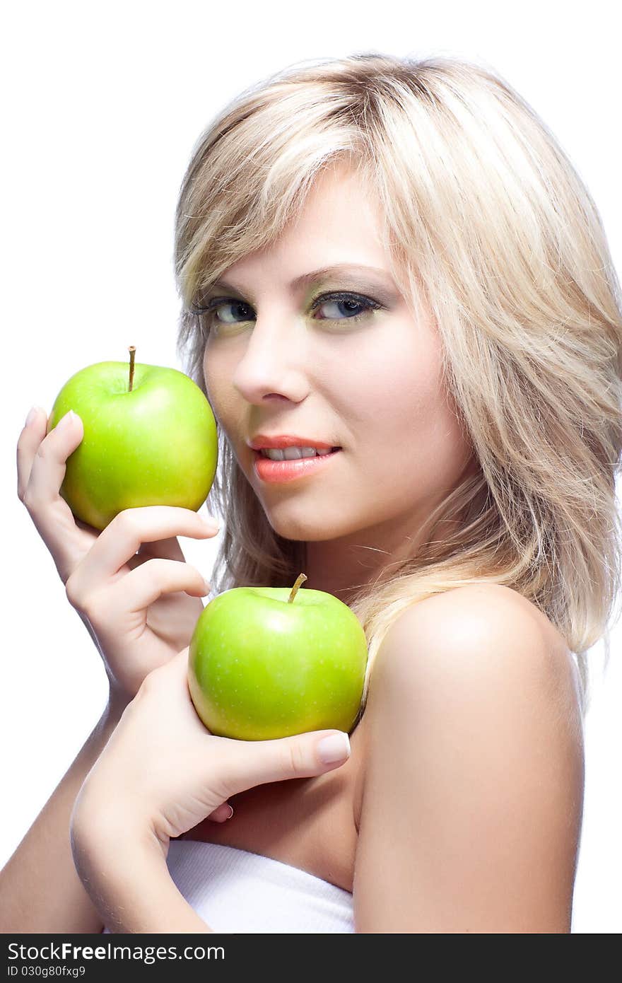 Beautiful woman over white background with apples. Beautiful woman over white background with apples