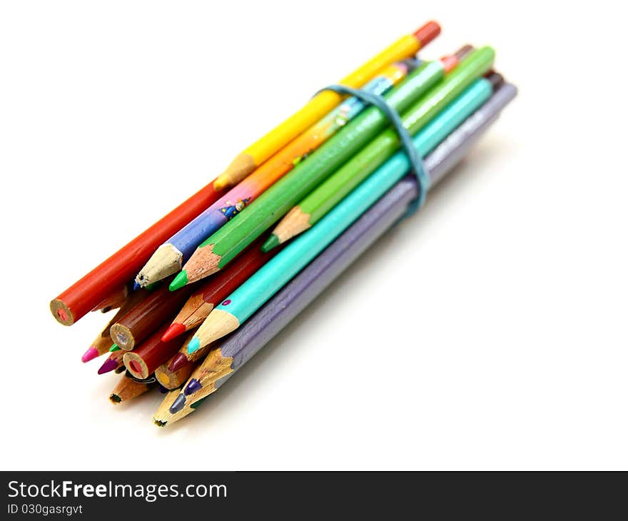 Colour pencils isolated on white background close up