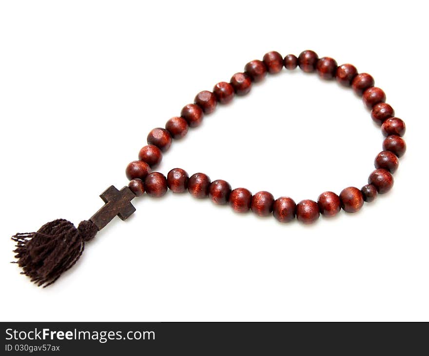 Bead-roll with wooden elements isolated on white background