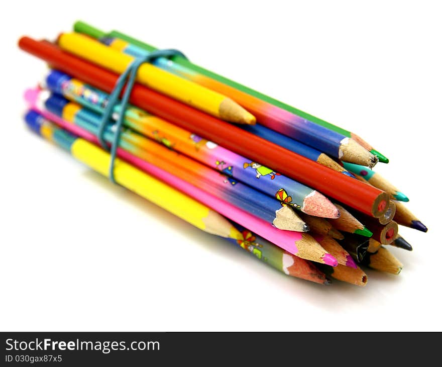 Colour pencils isolated on white background close up