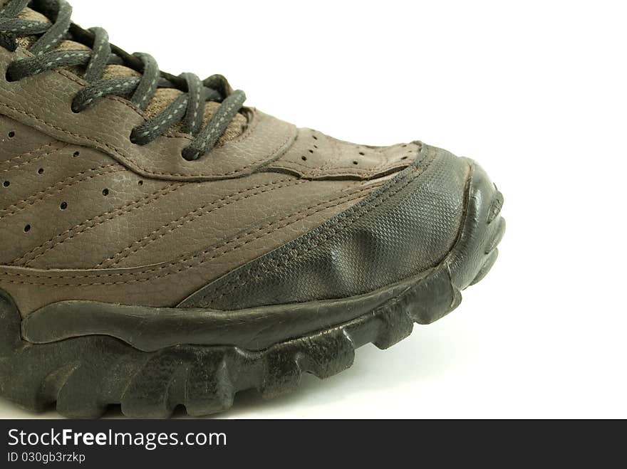 Trekking shoe foreground macro white background