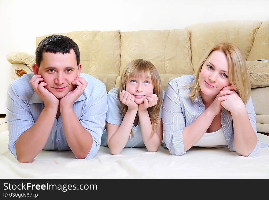 Young married couple and their daughter to spend time together in the interior