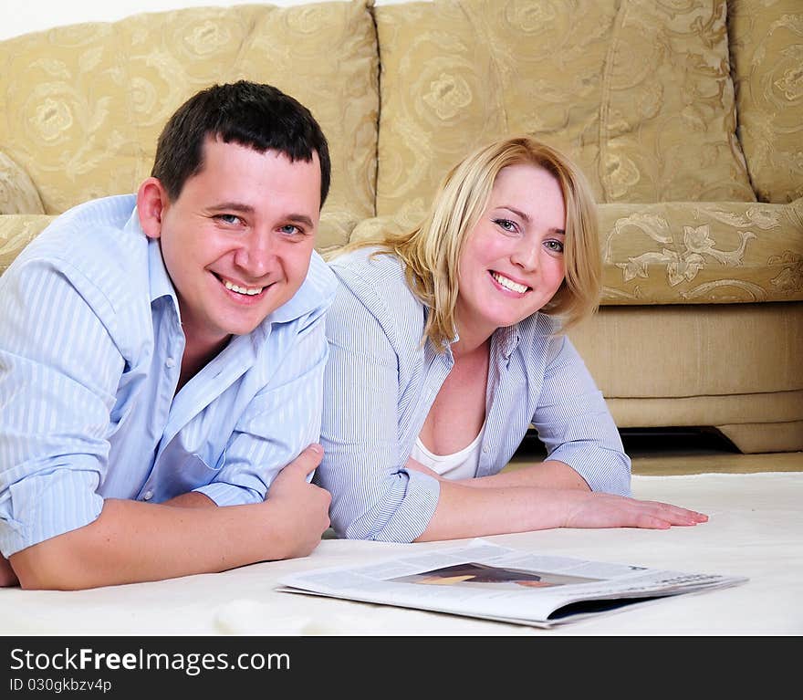 A young couple spends time together in the interior