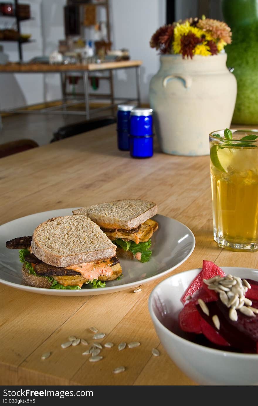 Tofu club sandwich with apple and beet salad