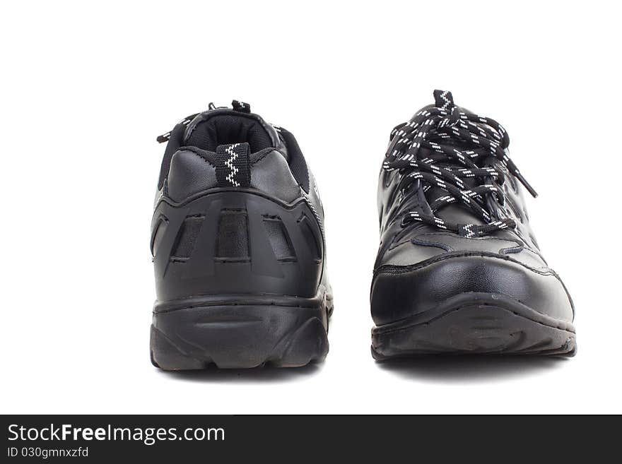 Series. Black leather shoes on a white background