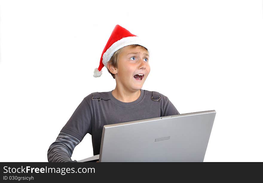 Scary adorable child with Santa Hat and with notebook