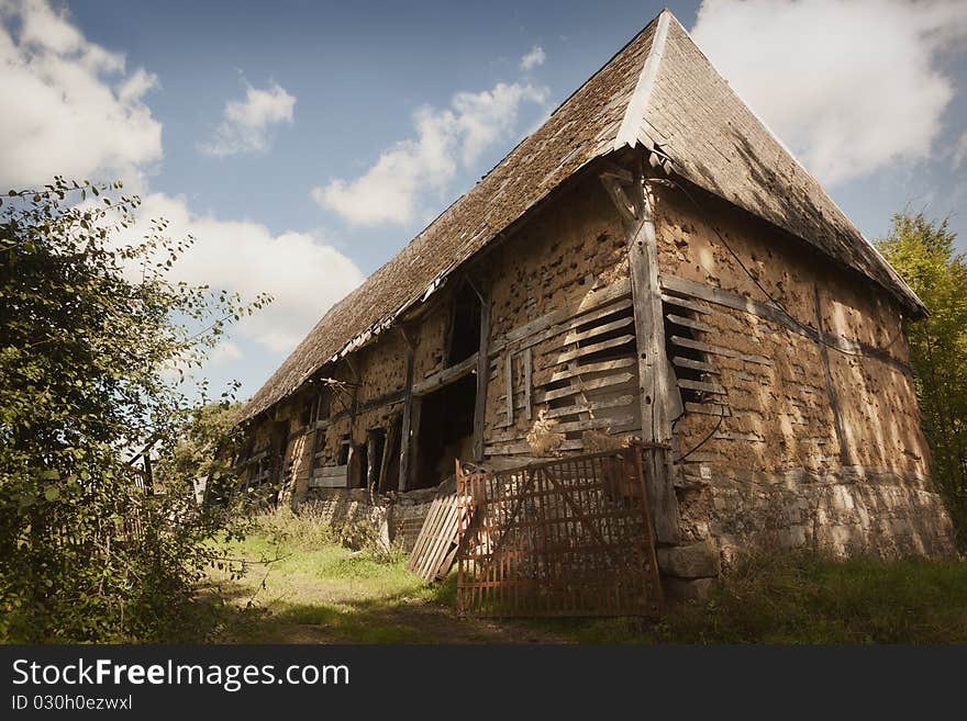 A dilapidated barn or farm out-house in France. A dilapidated barn or farm out-house in France