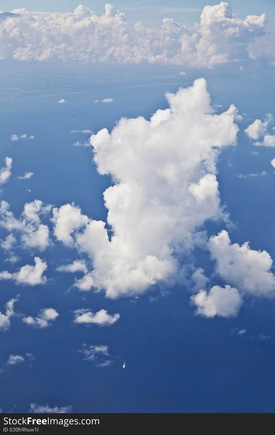 Puffy white cloudand blue sky