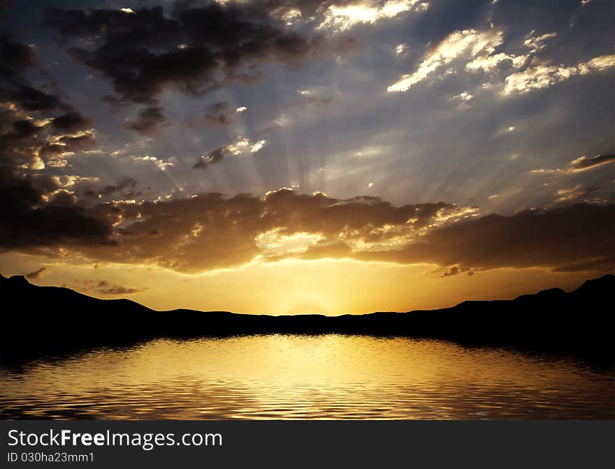 Sunset at coast of the sea