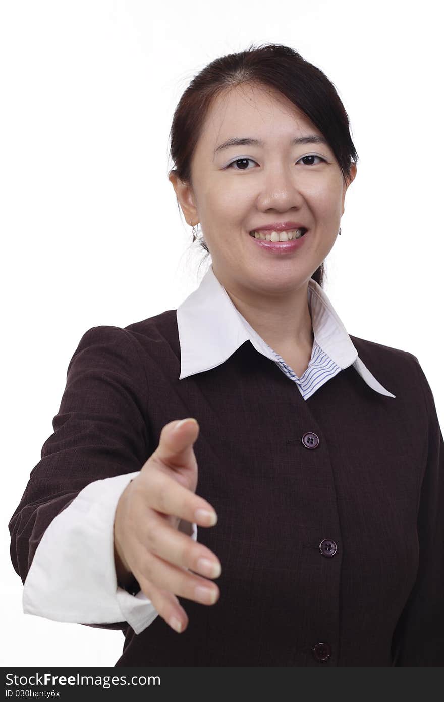 An Asian businesswoman offering a handshake